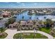 Aerial view of waterfront home with pool and landscaped grounds at 1925 Jamaica Way, Punta Gorda, FL 33950