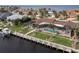 Aerial view of a waterfront home with pool and dock at 1925 Jamaica Way, Punta Gorda, FL 33950