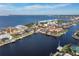 Aerial view of waterfront home with private dock and pool at 1925 Jamaica Way, Punta Gorda, FL 33950