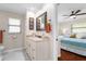 Elegant bathroom with granite vanity, updated fixtures and a view into bedroom at 1925 Jamaica Way, Punta Gorda, FL 33950
