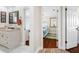 Guest bathroom with vanity and access to other rooms at 1925 Jamaica Way, Punta Gorda, FL 33950