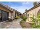 Charming courtyard featuring a fountain and meticulously landscaped gardens at 1925 Jamaica Way, Punta Gorda, FL 33950