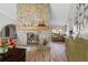 Stunning stone fireplace as a focal point in the living area at 1925 Jamaica Way, Punta Gorda, FL 33950