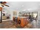 Spacious kitchen with island, granite countertops, stainless steel appliances, and wood cabinets at 1925 Jamaica Way, Punta Gorda, FL 33950