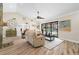 Living room with water views and sliding glass doors at 1925 Jamaica Way, Punta Gorda, FL 33950