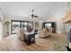 Relaxing living room with water views and leather seating at 1925 Jamaica Way, Punta Gorda, FL 33950