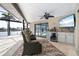 Covered patio overlooks the pool, offering an outdoor kitchen and bar at 1925 Jamaica Way, Punta Gorda, FL 33950