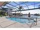 Enclosed pool and patio with water views at 1925 Jamaica Way, Punta Gorda, FL 33950