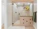 Large walk-in shower with glass enclosure and tiled walls at 1925 Jamaica Way, Punta Gorda, FL 33950