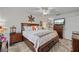 Main bedroom with ensuite bathroom and large TV at 19310 Water Oak Dr # 201, Port Charlotte, FL 33948