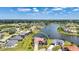 Gorgeous waterfront home featuring lovely landscaping with lake views in a desirable neighborhood at 24282 Silver Ln, Punta Gorda, FL 33955