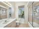 Clean bathroom with shower/tub combo and updated vanity at 24282 Silver Ln, Punta Gorda, FL 33955