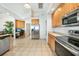 Kitchen with stainless steel appliances and wood cabinets at 24282 Silver Ln, Punta Gorda, FL 33955