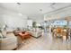 Spacious living area with comfortable seating and adjacent dining space at 24282 Silver Ln, Punta Gorda, FL 33955