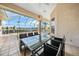 Relaxing pool area with patio furniture and water view at 24282 Silver Ln, Punta Gorda, FL 33955