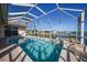 Refreshing screened pool with a relaxing spa at 24282 Silver Ln, Punta Gorda, FL 33955