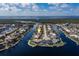 Aerial view of waterfront home with private pool and dock at 2813 Sancho Panza Ct, Punta Gorda, FL 33950