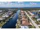 Aerial view showing the home's location on a canal with a large lot at 2813 Sancho Panza Ct, Punta Gorda, FL 33950