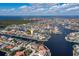 Wide aerial showcasing home's waterfront location in a canal community at 2813 Sancho Panza Ct, Punta Gorda, FL 33950