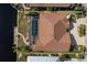 Top-down view of house featuring a pool and canal access at 2813 Sancho Panza Ct, Punta Gorda, FL 33950