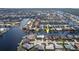 High-angle view of waterfront home in a residential community at 2813 Sancho Panza Ct, Punta Gorda, FL 33950