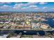 Wide aerial showcasing the property's location within a waterfront community at 2813 Sancho Panza Ct, Punta Gorda, FL 33950
