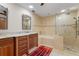 Spa-like bathroom with double vanity and large walk-in shower at 2813 Sancho Panza Ct, Punta Gorda, FL 33950