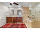 Bathroom with double vanity, large soaking tub, and separate shower at 2813 Sancho Panza Ct, Punta Gorda, FL 33950