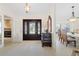 Bright and spacious entryway with views into living and dining areas at 2813 Sancho Panza Ct, Punta Gorda, FL 33950