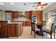 Eat-in kitchen with granite countertops, stainless steel appliances and breakfast nook at 2813 Sancho Panza Ct, Punta Gorda, FL 33950