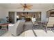 Covered lanai with seating area and view of the pool at 2813 Sancho Panza Ct, Punta Gorda, FL 33950