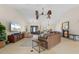 Spacious living room with comfortable seating and large TV at 2813 Sancho Panza Ct, Punta Gorda, FL 33950