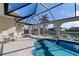 Relaxing pool and lanai area with canal views at 2813 Sancho Panza Ct, Punta Gorda, FL 33950