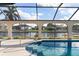 Screened pool and lanai overlooking canal at 2813 Sancho Panza Ct, Punta Gorda, FL 33950