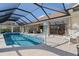 Enclosed pool and spa with access to the house at 2813 Sancho Panza Ct, Punta Gorda, FL 33950
