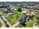 Aerial view of residential neighborhood showcasing homes and waterways at 3021 Palm Dr, Punta Gorda, FL 33950