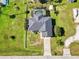 Single-Gathering home with a large backyard and driveway at 3021 Palm Dr, Punta Gorda, FL 33950