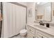 Clean bathroom with updated vanity and a shower/tub combo at 3021 Palm Dr, Punta Gorda, FL 33950
