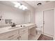 Clean bathroom with updated vanity and a large mirror at 3021 Palm Dr, Punta Gorda, FL 33950