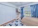 Charming bedroom with twin bed and built-in shelving at 3021 Palm Dr, Punta Gorda, FL 33950