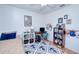 Bright bedroom with built-in shelving and comfortable furnishings at 3021 Palm Dr, Punta Gorda, FL 33950