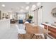Bright dining area with mid-century modern table and chairs at 3021 Palm Dr, Punta Gorda, FL 33950