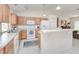 Bright kitchen with updated appliances and an island at 3021 Palm Dr, Punta Gorda, FL 33950
