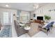 Spacious living room with comfortable seating and a large window at 3021 Palm Dr, Punta Gorda, FL 33950