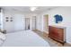 Main bedroom with king-size bed and built-in dresser at 3021 Palm Dr, Punta Gorda, FL 33950