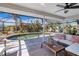 Relaxing screened-in pool area with patio furniture at 3021 Palm Dr, Punta Gorda, FL 33950