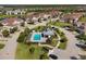 Aerial view of community pool and neighborhood at 14025 Black Beauty Dr # 412, Punta Gorda, FL 33955