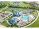 Aerial view of community amenities including pool, tennis, and pickleball courts at 14025 Black Beauty Dr # 412, Punta Gorda, FL 33955