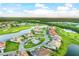 Luxury homes surrounding a lake and golf course at 14025 Black Beauty Dr # 412, Punta Gorda, FL 33955