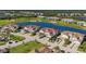 Community overview showcasing homes near golf course and lake at 14025 Black Beauty Dr # 412, Punta Gorda, FL 33955